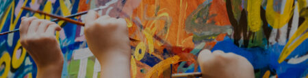young people painting a mural